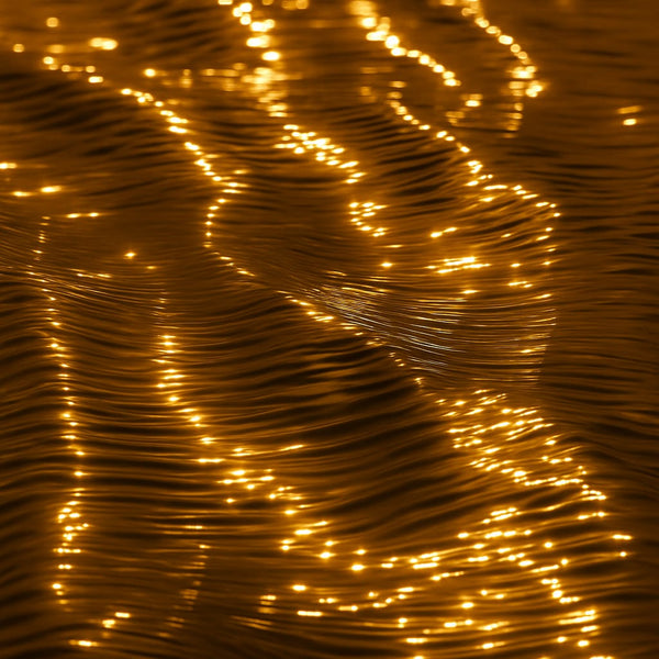 Close-up of gold melted metal a textured surface