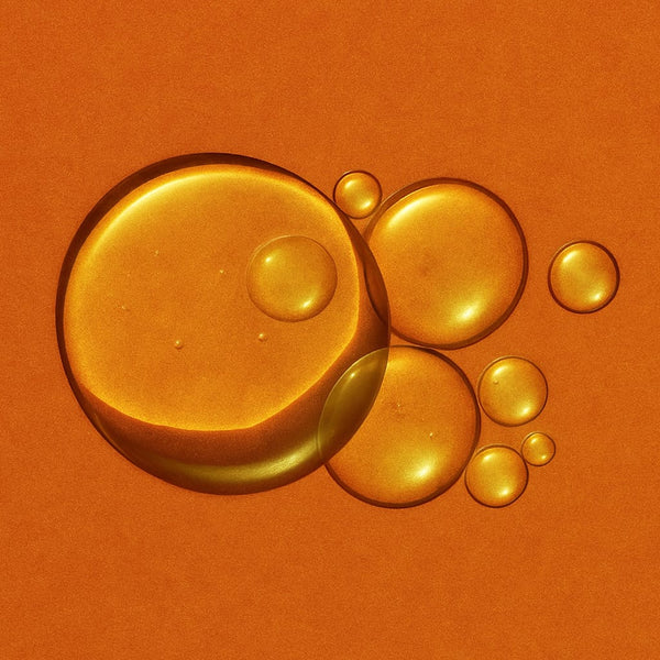 Gold bubbles on an orange background